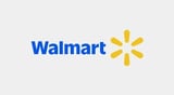 Walmart logo with blue text and yellow spark symbol on gray background